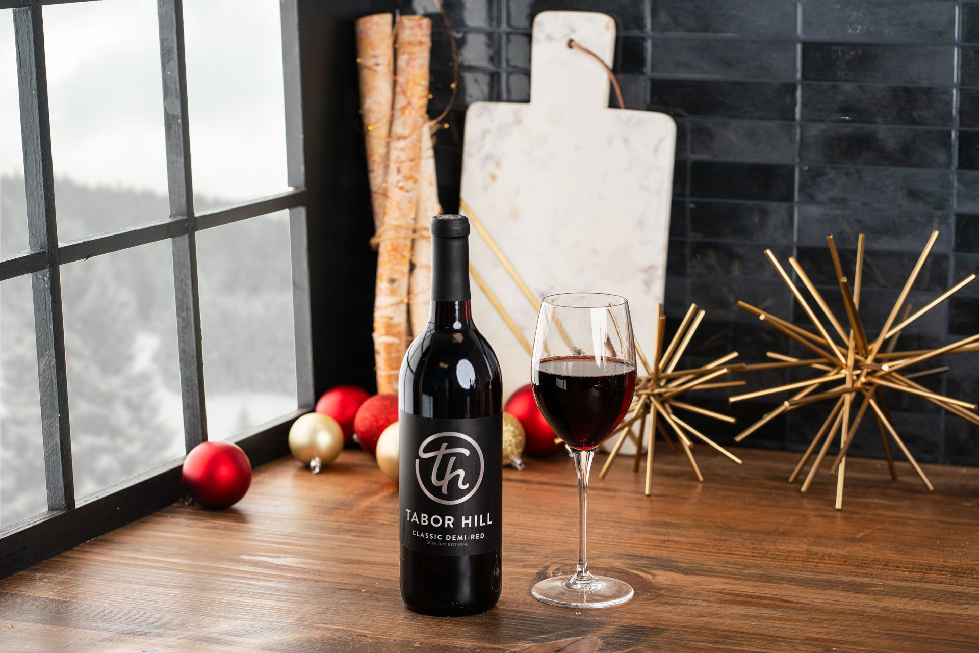 Tabor Hill wine bottles styled for a seasonal product campaign